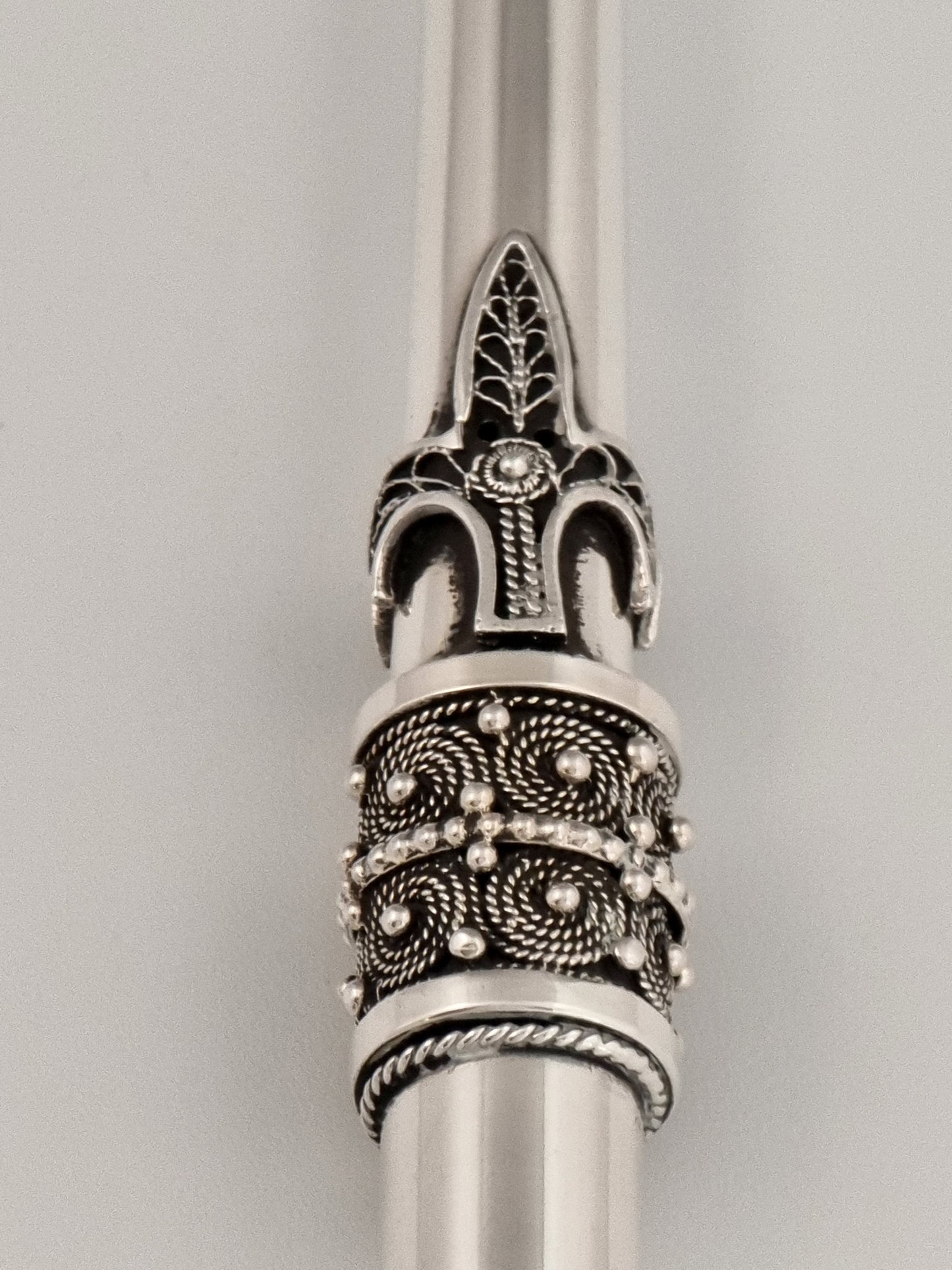 Daniel Torah pointer adorned with intricate filigree work
