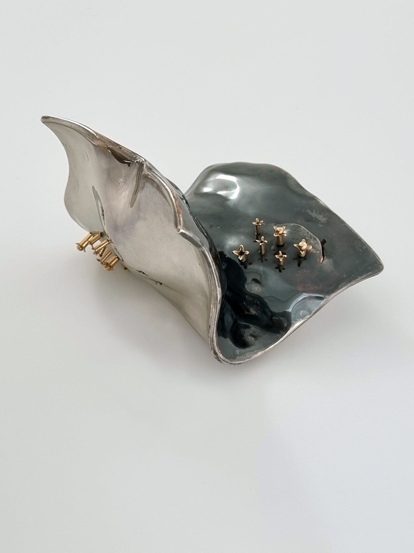Bottom side of spice box made of oxidized silver