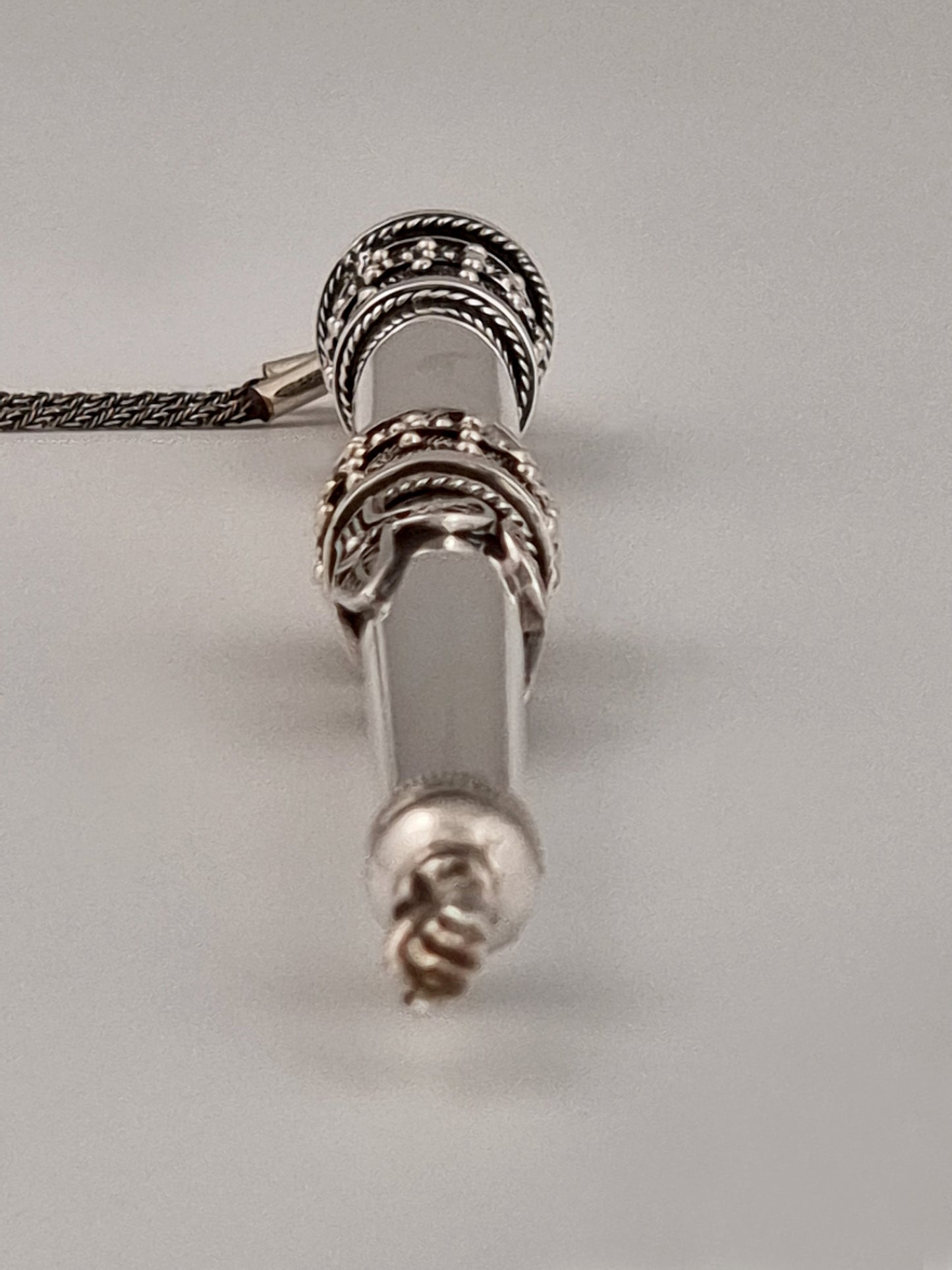 Daniel Torah Pointer. This Torah pointer was designed in 1990. It is 8” long and made of sterling silver.