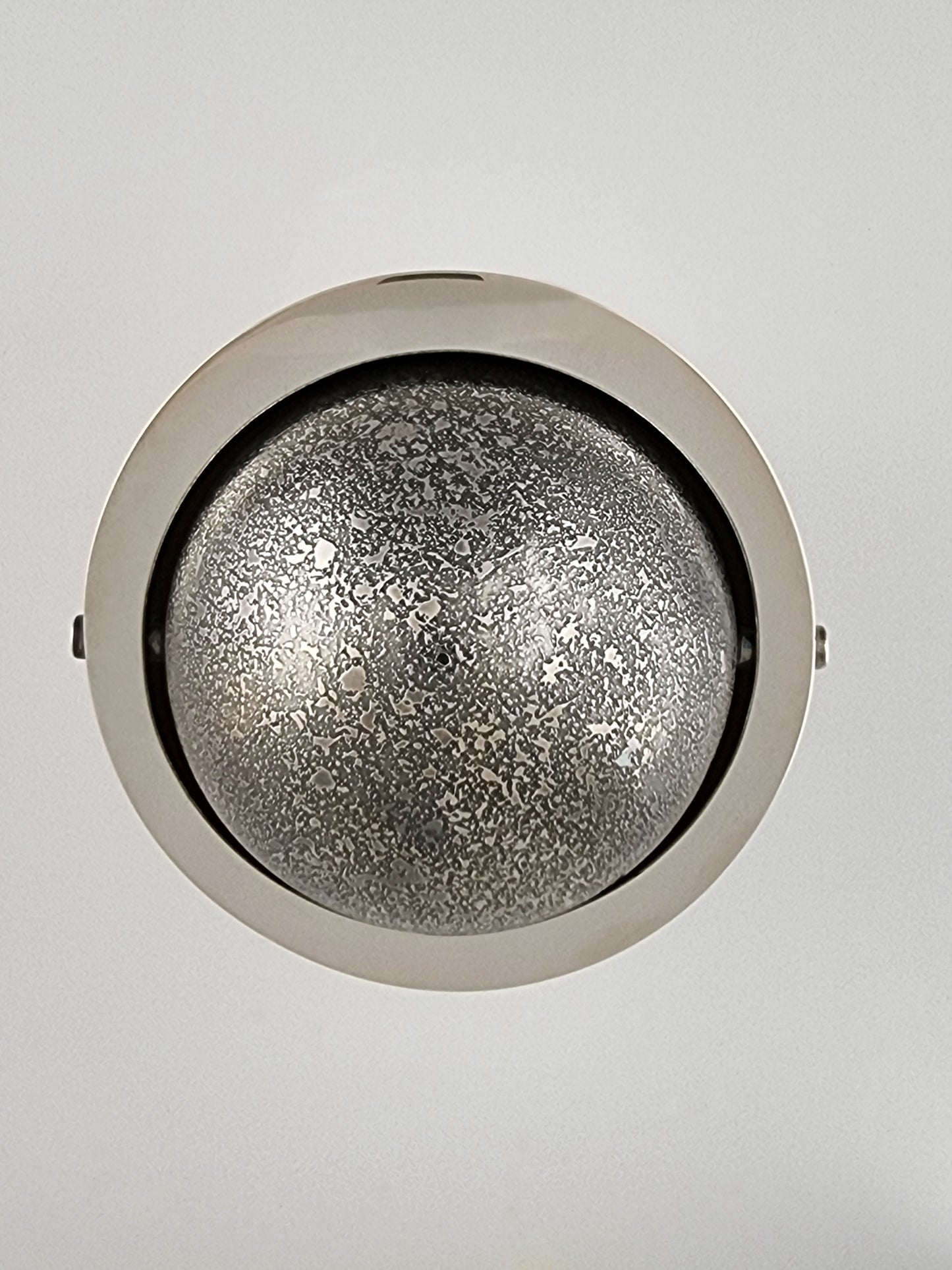 Etched part of the ball. The words are hidden inside at this position.