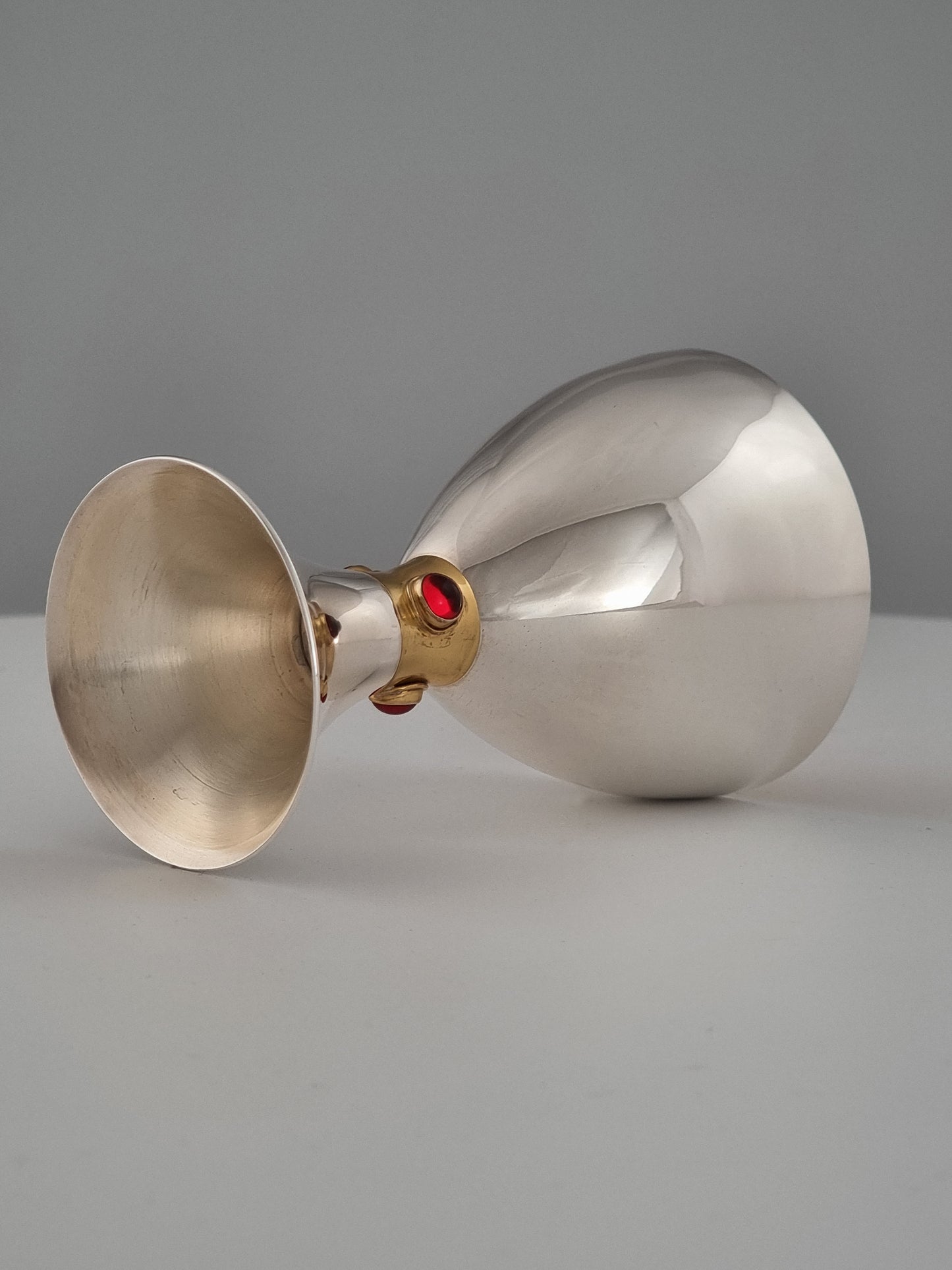 Garnet stone shining in the center of our Deborah Kiddush cup