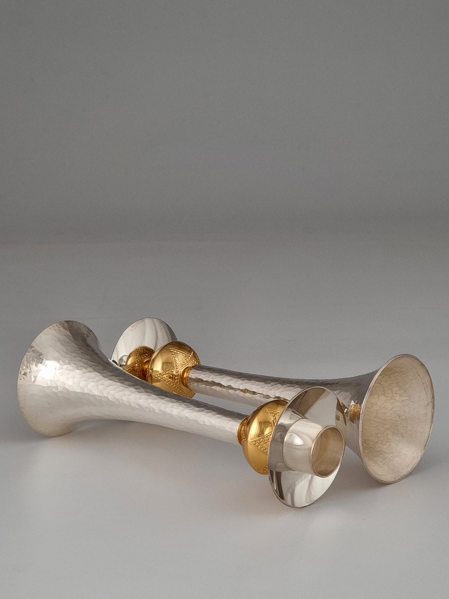 Hammered candlesticks made of silver