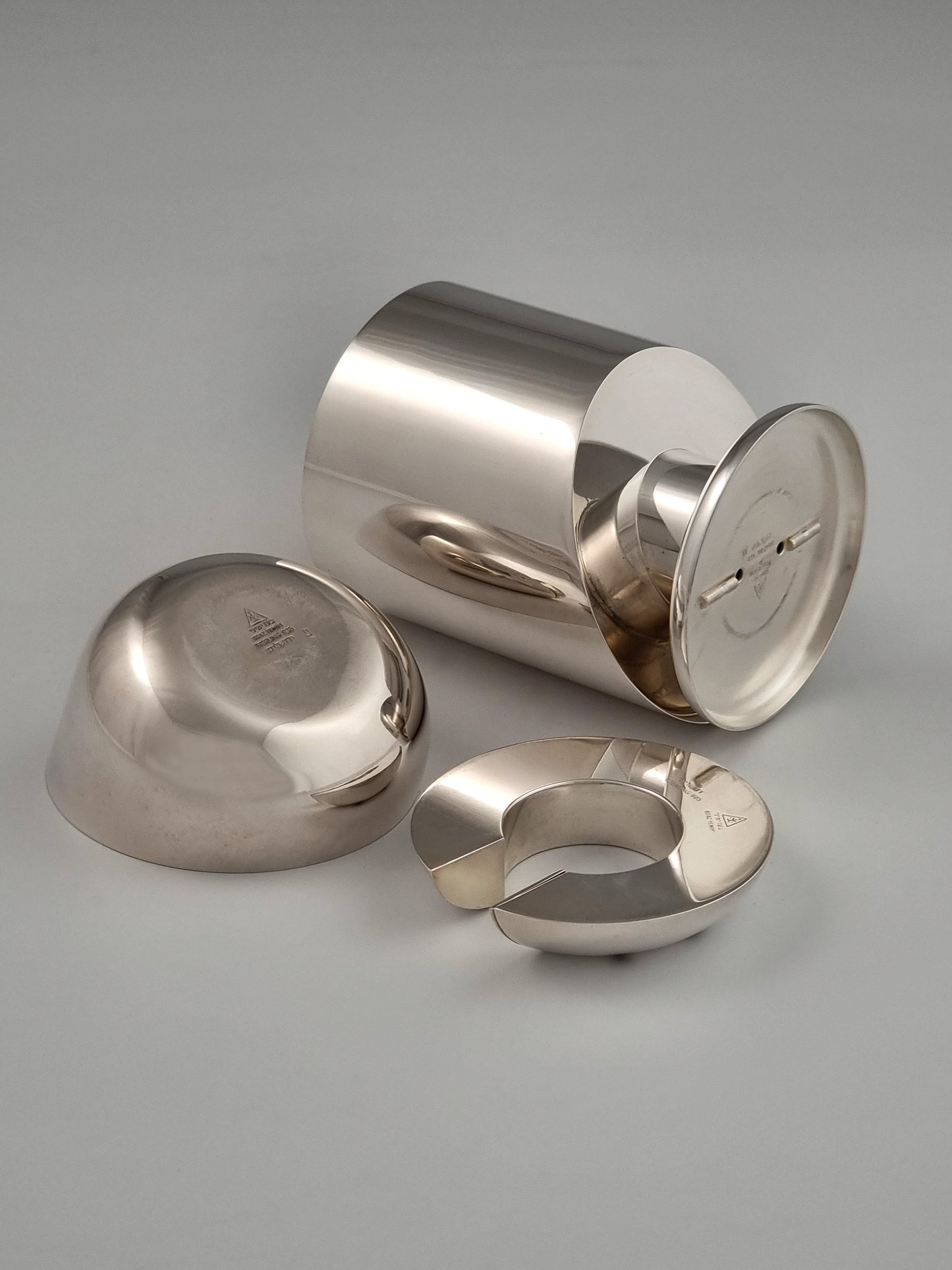 Disassembled view shows the bottom of each piece.