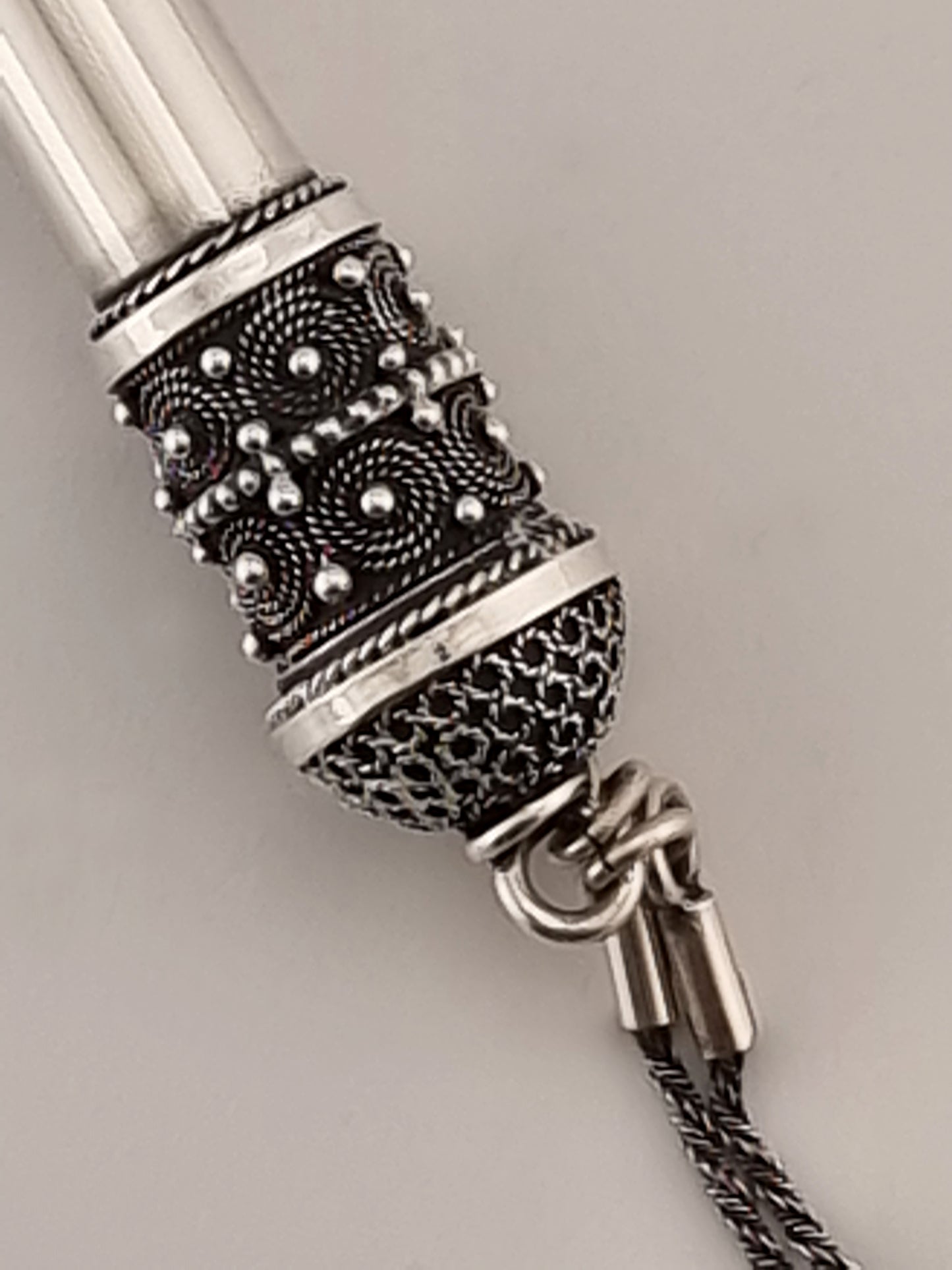 Filigree base of Torah pointer