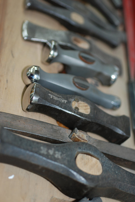 Silversmith hammers of different kinds. We use over 60 types in our meticulous process