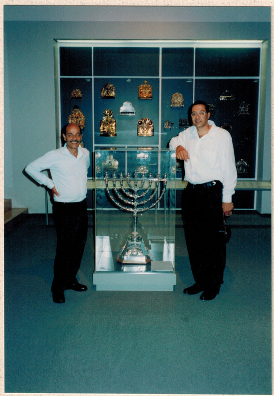 Yemini artists Yaacov (left) and Boaz (right) with their grand Hanukkiah on display in Israel Museum in Jerusalem. 