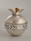 Pomegranate Spice Box. This spice box was designed in 1998 and made of sterling silver, oxidized silver, and gold-plated silver. It measures 2½” by 4” by 4½“.