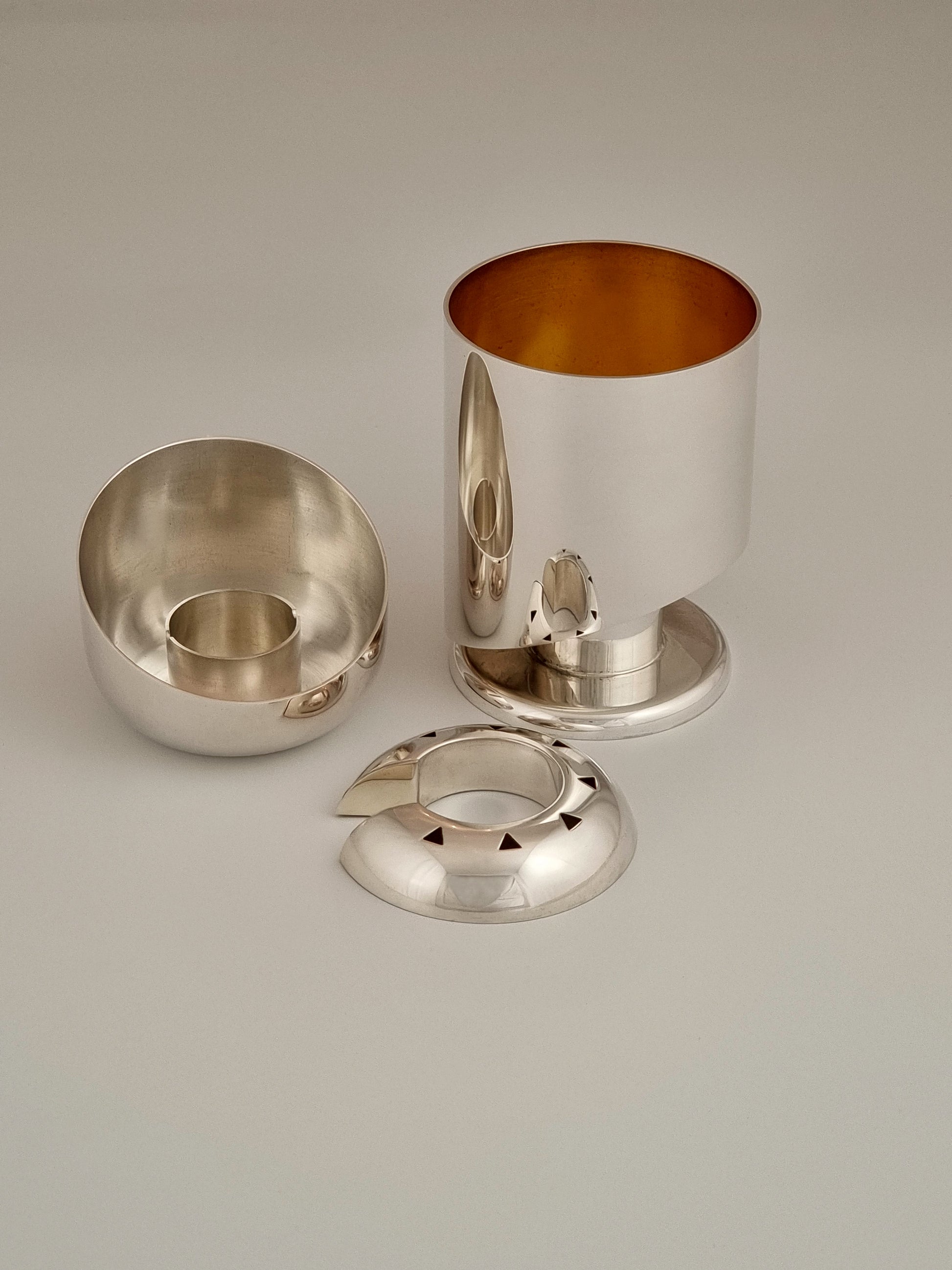 Havdalah set comprised of a Kiddush cup, spice box and candle holder.