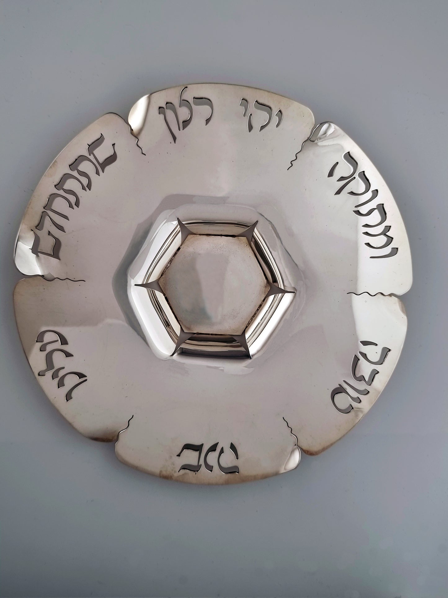 Top view of Abigail Honey Dish. This unique design has six leaves, each leaf partly separated in two dimensions.