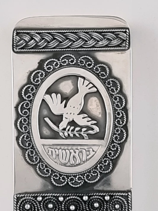 Chumash Mezuzah Set. This five-piece mezuzah set was designed in 1997; each piece is made of sterling silver and measures 5" long and 1½" wide.