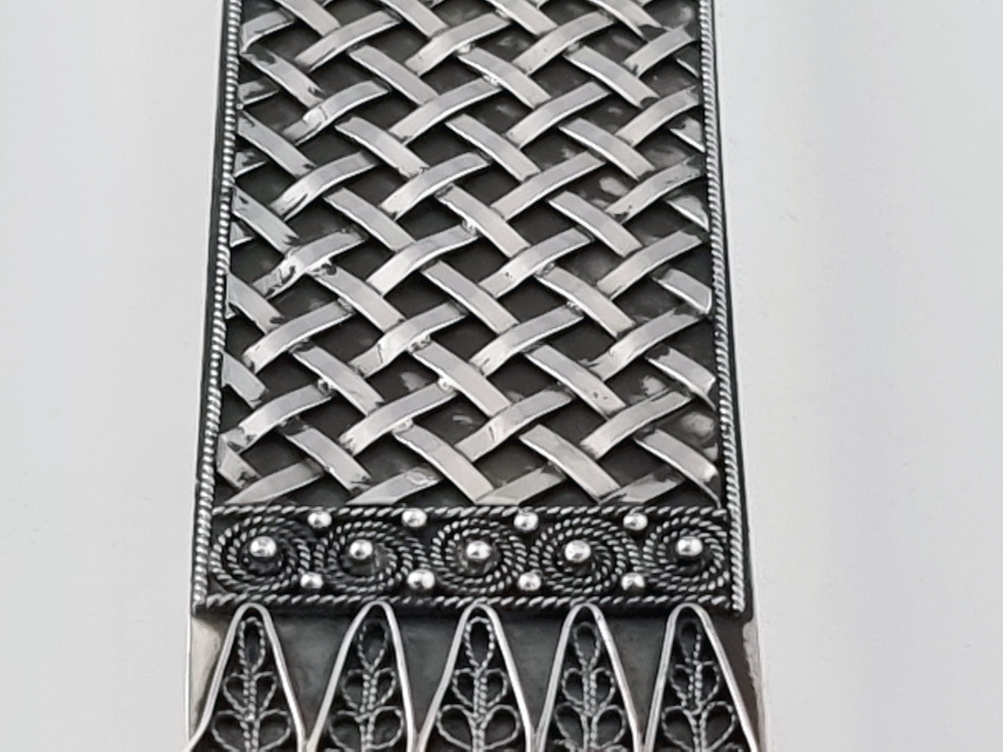 Loops, twists and lattice made of 925 sterling on a Chumash Mezuzah