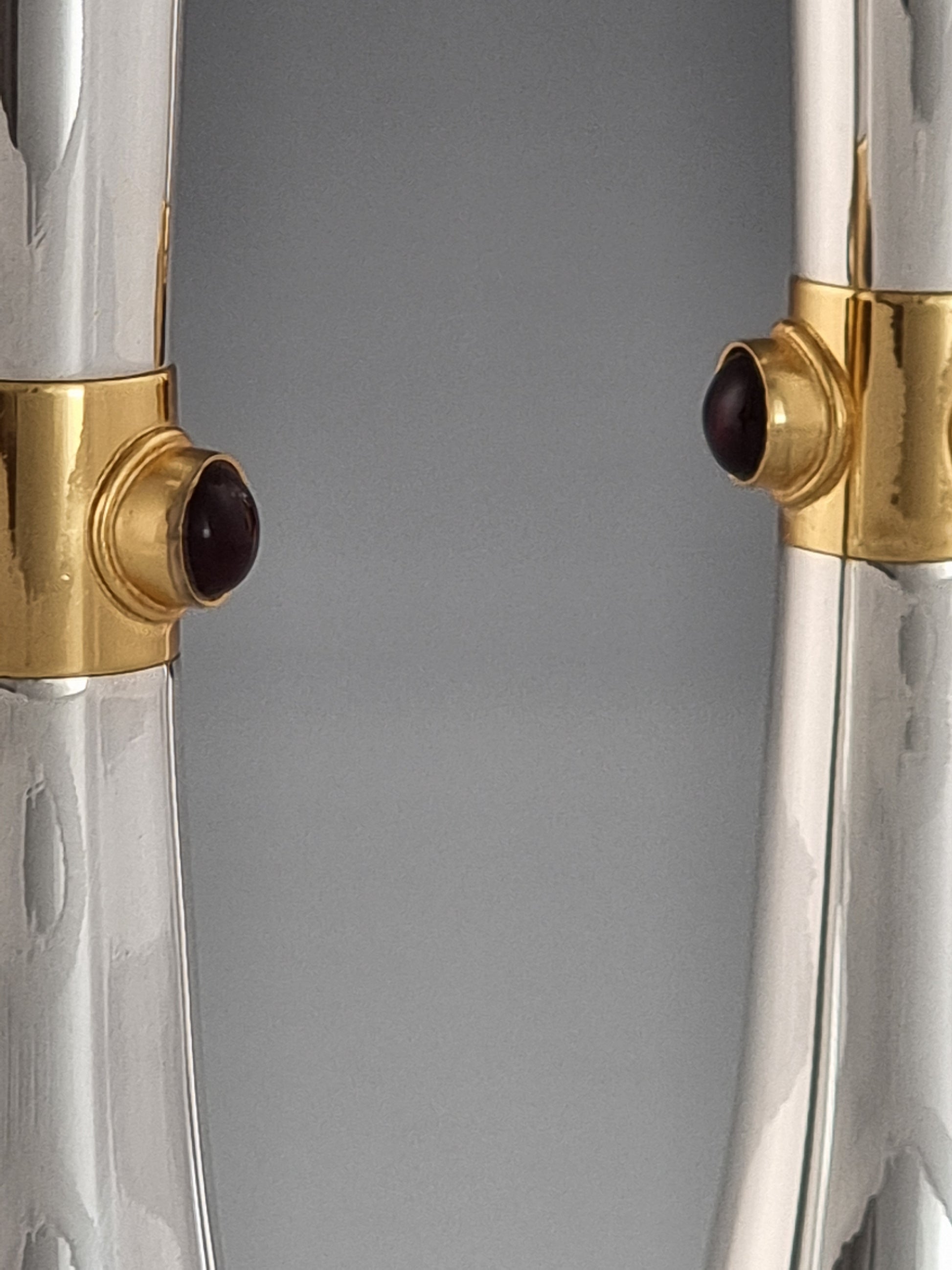 Close-up view of the Deborah candlesticks showing the ribbon and stones